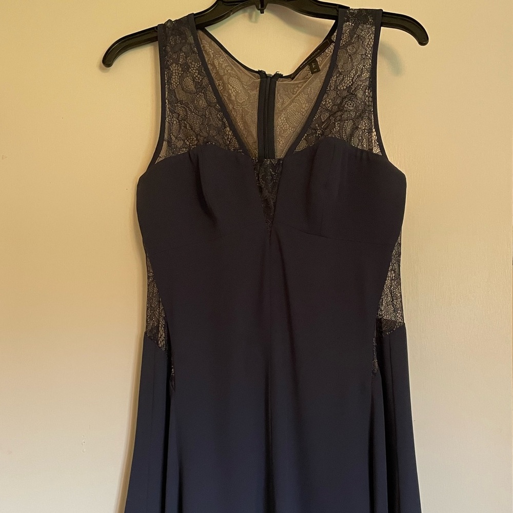 Navy blue mini dress with backless design